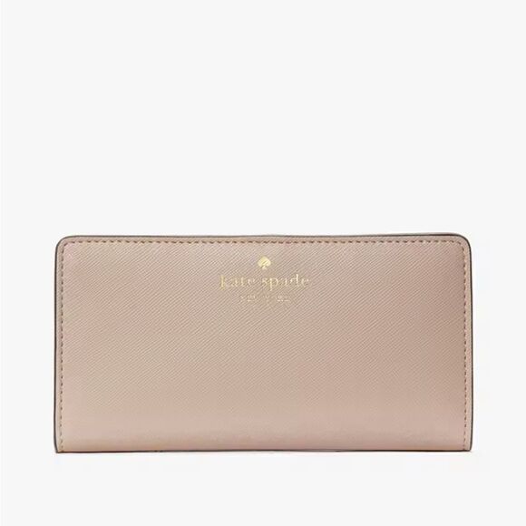 kate spade Handbags - Kate spade SCHUYLER LARGE SLIM BIFOLD WALLET